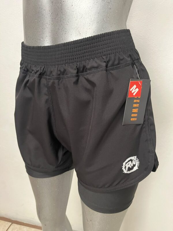 short_runner_dama_negro_frontal Short runner con licra para dama